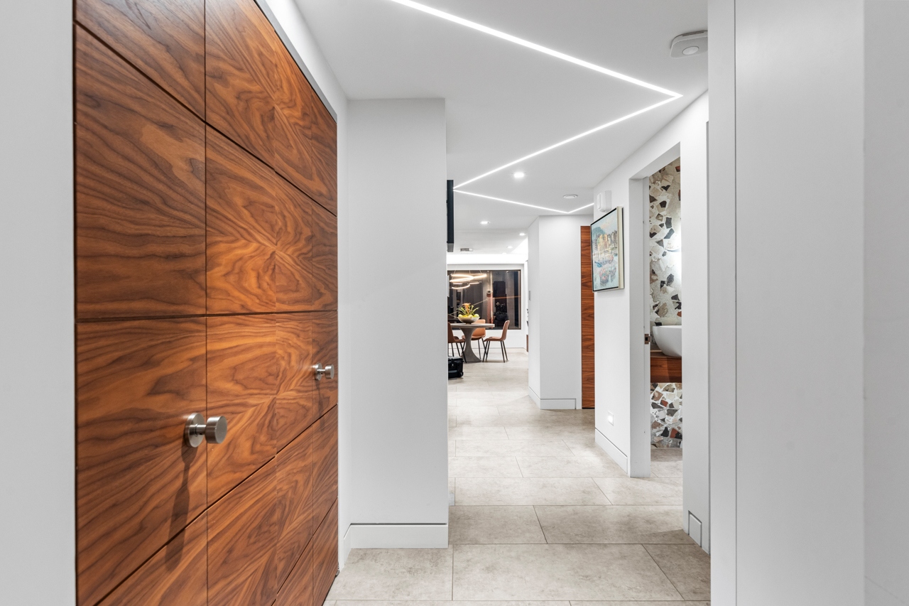 Hallway with walnut solid-core doors